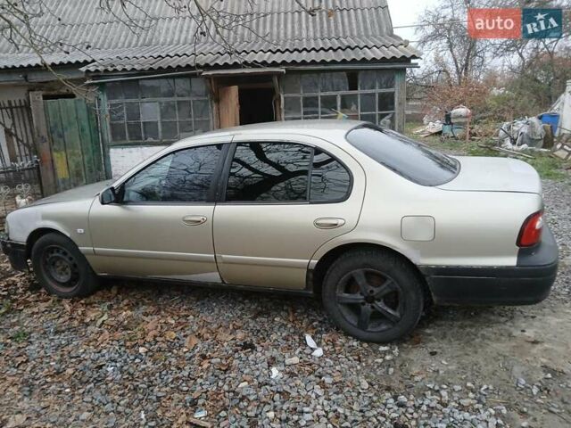 Желтый Самсунг СМ5, объемом двигателя 2 л и пробегом 390 тыс. км за 2000 $, фото 1 на Automoto.ua