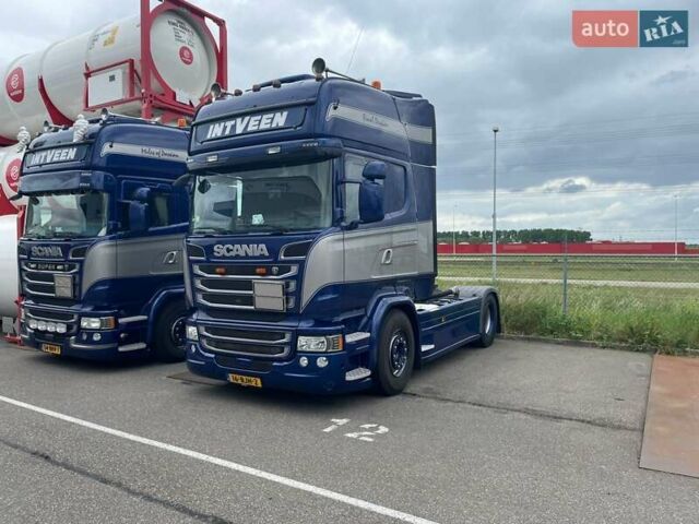 Синий Сканиа R 410, объемом двигателя 13 л и пробегом 580 тыс. км за 37850 $, фото 1 на Automoto.ua