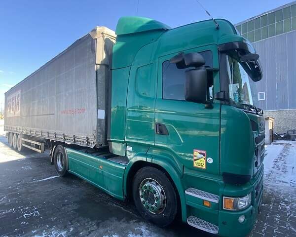 Зеленый Сканиа R 410, объемом двигателя 13 л и пробегом 846 тыс. км за 25360 $, фото 1 на Automoto.ua