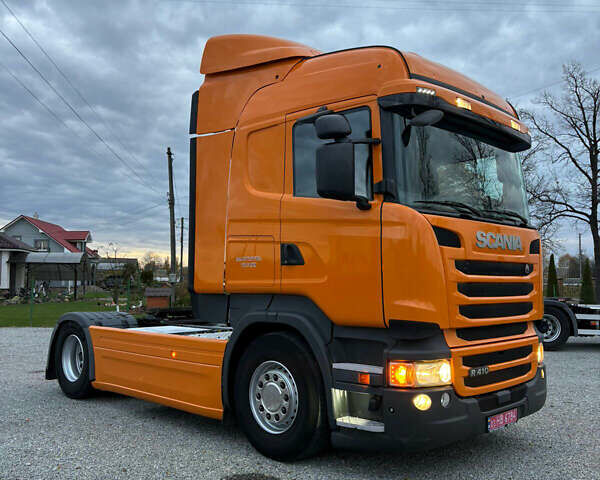 Помаранчевий Сканіа R 410, об'ємом двигуна 12.7 л та пробігом 953 тис. км за 29900 $, фото 1 на Automoto.ua