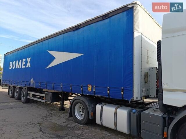 Красный Шмитц Каргобулл SSD, объемом двигателя 6 л и пробегом 250 тыс. км за 8593 $, фото 1 на Automoto.ua