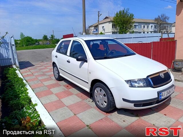 Белый Шкода Фабия, объемом двигателя 1.2 л и пробегом 208 тыс. км за 2850 $, фото 1 на Automoto.ua