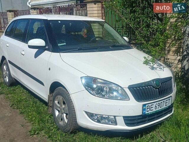Белый Шкода Фабия, объемом двигателя 1.39 л и пробегом 196 тыс. км за 6500 $, фото 1 на Automoto.ua