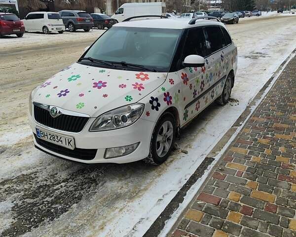 Белый Шкода Фабия, объемом двигателя 1.2 л и пробегом 169 тыс. км за 6300 $, фото 1 на Automoto.ua