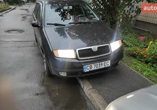 Черный Шкода Фабия, объемом двигателя 1.4 л и пробегом 450 тыс. км за 3300 $, фото 1 на Automoto.ua
