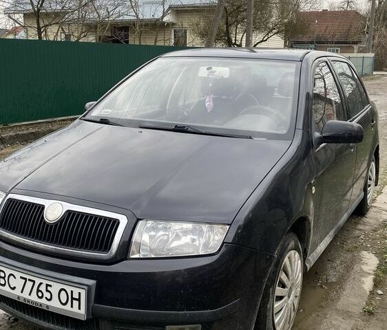 Черный Шкода Фабия, объемом двигателя 1.4 л и пробегом 270 тыс. км за 1900 $, фото 1 на Automoto.ua