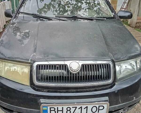 Черный Шкода Фабия, объемом двигателя 1.39 л и пробегом 385 тыс. км за 2800 $, фото 1 на Automoto.ua