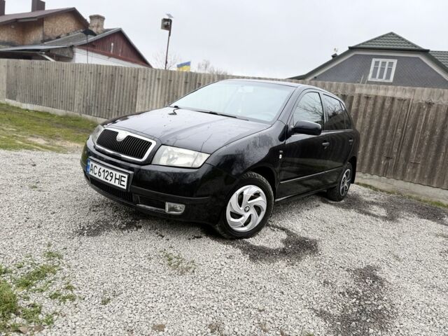 Черный Шкода Фабия, объемом двигателя 1.4 л и пробегом 201 тыс. км за 4100 $, фото 1 на Automoto.ua