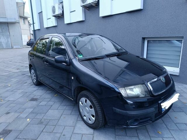 Черный Шкода Фабия, объемом двигателя 1.2 л и пробегом 277 тыс. км за 3500 $, фото 1 на Automoto.ua