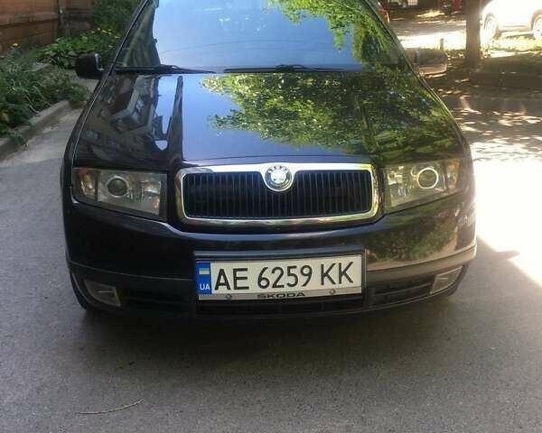 Черный Шкода Фабия, объемом двигателя 1.2 л и пробегом 201 тыс. км за 4500 $, фото 1 на Automoto.ua