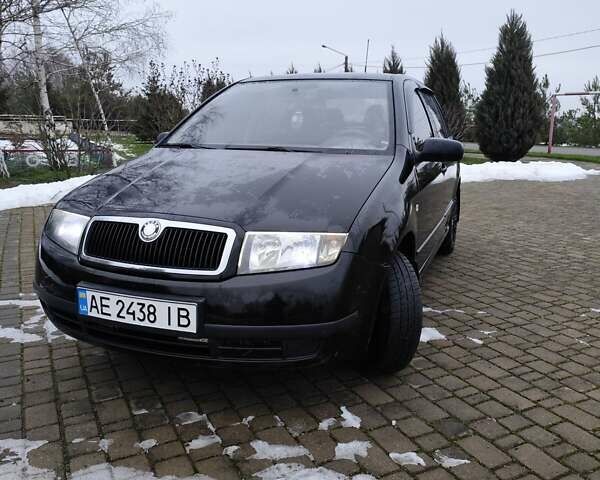 Чорний Шкода Фабія, об'ємом двигуна 1.2 л та пробігом 114 тис. км за 4200 $, фото 1 на Automoto.ua