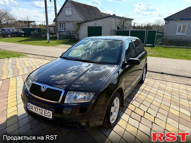 Чорний Шкода Фабія, об'ємом двигуна 1.4 л та пробігом 220 тис. км за 3950 $, фото 1 на Automoto.ua