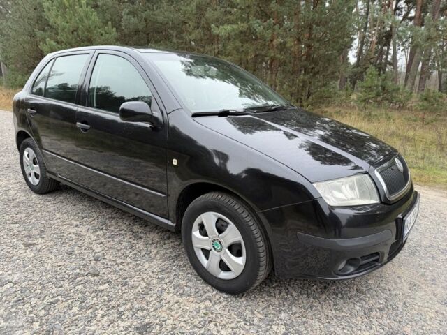 Черный Шкода Фабия, объемом двигателя 1.2 л и пробегом 175 тыс. км за 3950 $, фото 1 на Automoto.ua