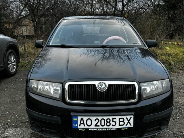 Черный Шкода Фабия, объемом двигателя 1.2 л и пробегом 204 тыс. км за 2750 $, фото 1 на Automoto.ua