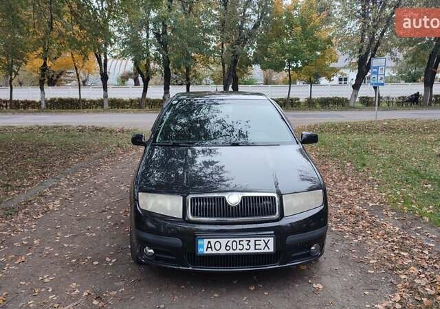 Черный Шкода Фабия, объемом двигателя 1.2 л и пробегом 234 тыс. км за 4200 $, фото 1 на Automoto.ua