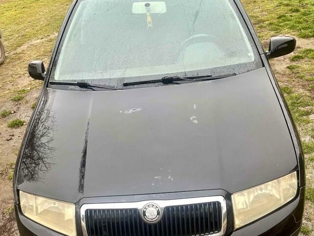 Черный Шкода Фабия, объемом двигателя 1.2 л и пробегом 0 тыс. км за 1900 $, фото 1 на Automoto.ua