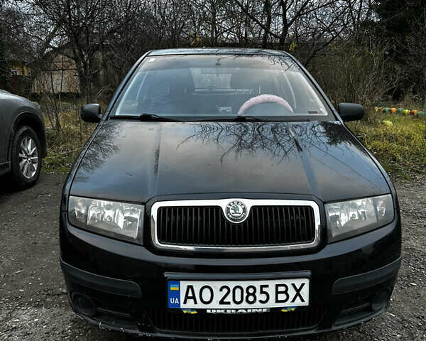 Черный Шкода Фабия, объемом двигателя 1.2 л и пробегом 204 тыс. км за 2750 $, фото 1 на Automoto.ua