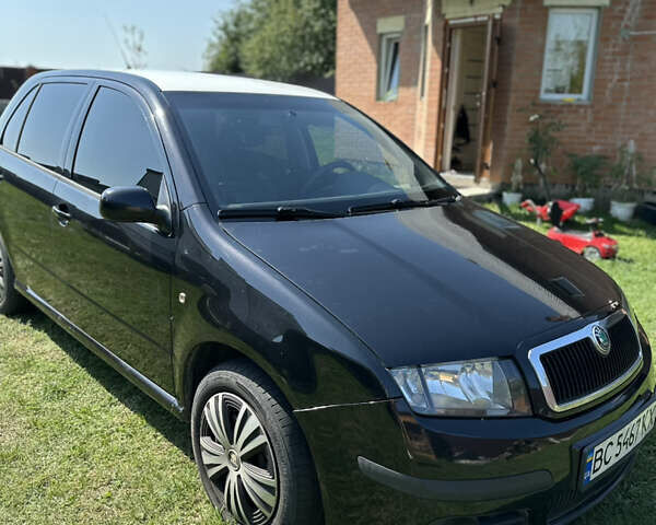 Чорний Шкода Фабія, об'ємом двигуна 1.4 л та пробігом 300 тис. км за 4500 $, фото 1 на Automoto.ua