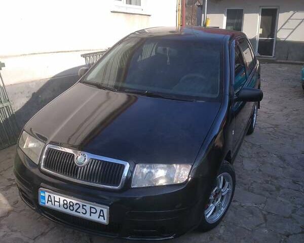 Черный Шкода Фабия, объемом двигателя 1.2 л и пробегом 335 тыс. км за 2950 $, фото 1 на Automoto.ua