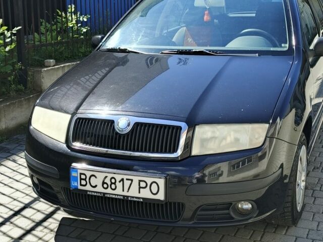 Черный Шкода Фабия, объемом двигателя 1.4 л и пробегом 215 тыс. км за 3400 $, фото 1 на Automoto.ua