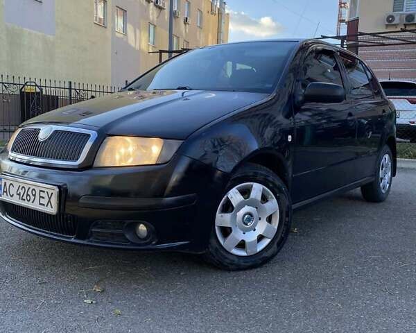 Черный Шкода Фабия, объемом двигателя 1.2 л и пробегом 340 тыс. км за 3150 $, фото 1 на Automoto.ua