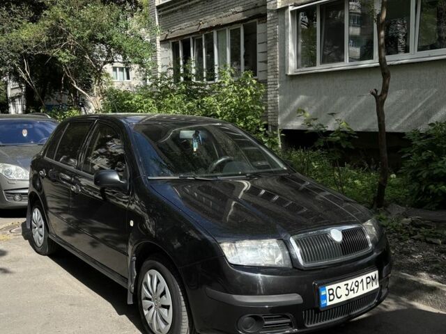 Черный Шкода Фабия, объемом двигателя 1.2 л и пробегом 203 тыс. км за 3500 $, фото 1 на Automoto.ua
