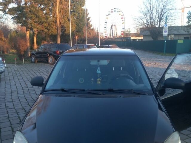 Черный Шкода Фабия, объемом двигателя 1.2 л и пробегом 294 тыс. км за 4100 $, фото 1 на Automoto.ua