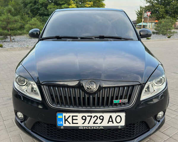 Черный Шкода Фабия, объемом двигателя 1.39 л и пробегом 235 тыс. км за 8500 $, фото 1 на Automoto.ua