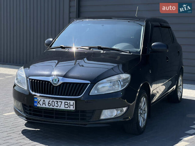 Черный Шкода Фабия, объемом двигателя 1.39 л и пробегом 212 тыс. км за 5950 $, фото 1 на Automoto.ua