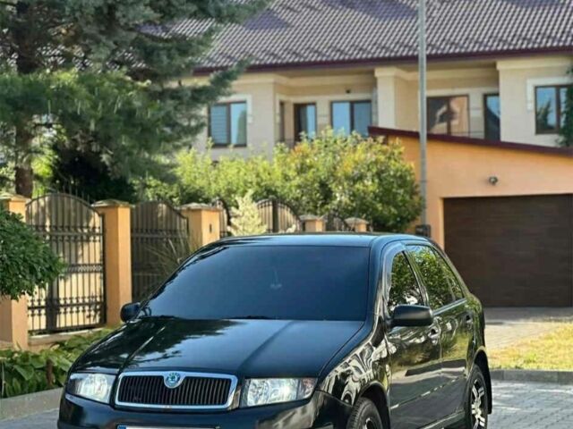 Черный Шкода Фабия, объемом двигателя 1.2 л и пробегом 197 тыс. км за 3200 $, фото 1 на Automoto.ua