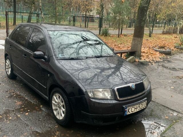 Черный Шкода Фабия, объемом двигателя 1.4 л и пробегом 210 тыс. км за 1600 $, фото 1 на Automoto.ua
