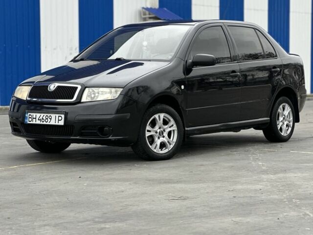 Черный Шкода Фабия, объемом двигателя 1.2 л и пробегом 200 тыс. км за 3100 $, фото 1 на Automoto.ua