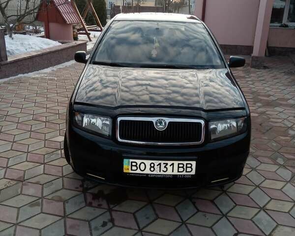 Черный Шкода Фабия, объемом двигателя 1.2 л и пробегом 112 тыс. км за 3600 $, фото 1 на Automoto.ua