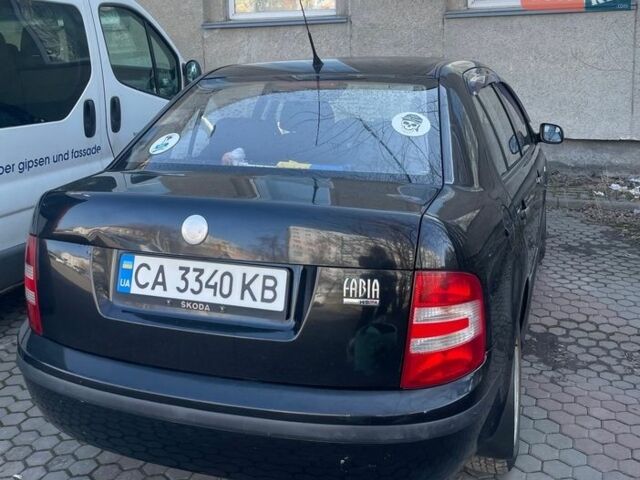 Черный Шкода Фабия, объемом двигателя 1.2 л и пробегом 244 тыс. км за 3500 $, фото 1 на Automoto.ua