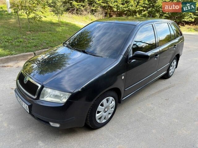 Черный Шкода Фабия, объемом двигателя 1.4 л и пробегом 223 тыс. км за 3499 $, фото 1 на Automoto.ua