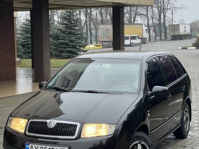 Черный Шкода Фабия, объемом двигателя 1.4 л и пробегом 289 тыс. км за 3470 $, фото 1 на Automoto.ua