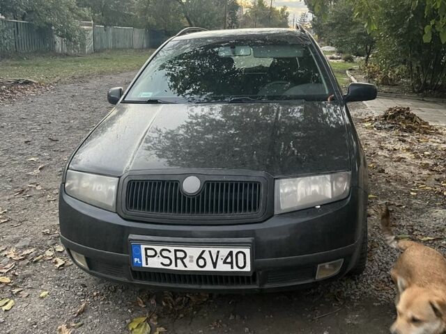 Черный Шкода Фабия, объемом двигателя 2 л и пробегом 320 тыс. км за 1788 $, фото 1 на Automoto.ua