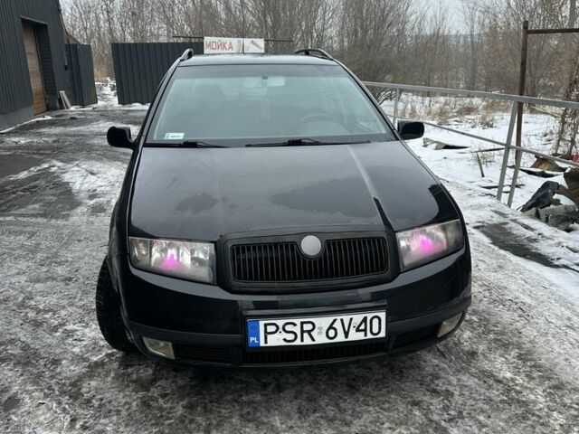 Черный Шкода Фабия, объемом двигателя 2 л и пробегом 323 тыс. км за 2792 $, фото 1 на Automoto.ua