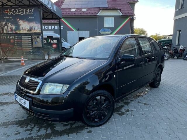 Черный Шкода Фабия, объемом двигателя 1.2 л и пробегом 290 тыс. км за 2500 $, фото 1 на Automoto.ua