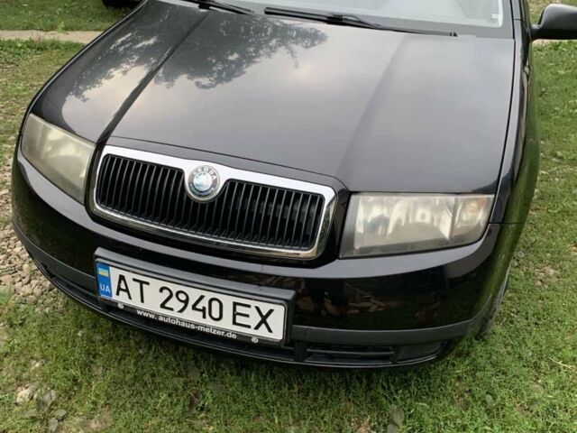 Черный Шкода Фабия, объемом двигателя 1.39 л и пробегом 264 тыс. км за 3500 $, фото 1 на Automoto.ua