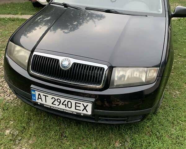 Черный Шкода Фабия, объемом двигателя 1.39 л и пробегом 264 тыс. км за 3600 $, фото 1 на Automoto.ua