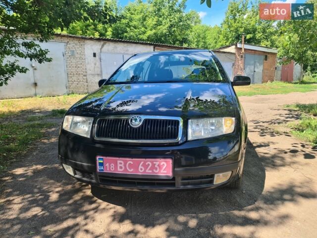 Чорний Шкода Фабія, об'ємом двигуна 1.4 л та пробігом 215 тис. км за 4399 $, фото 1 на Automoto.ua