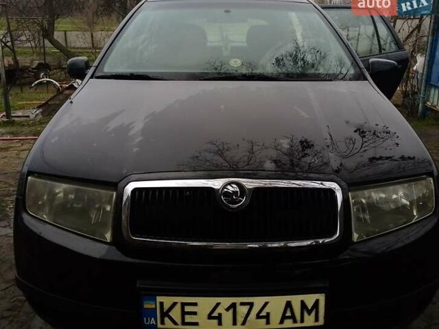 Черный Шкода Фабия, объемом двигателя 1.39 л и пробегом 220 тыс. км за 4800 $, фото 1 на Automoto.ua