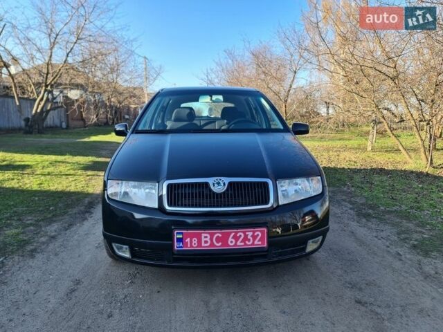 Черный Шкода Фабия, объемом двигателя 1.4 л и пробегом 215 тыс. км за 4550 $, фото 1 на Automoto.ua