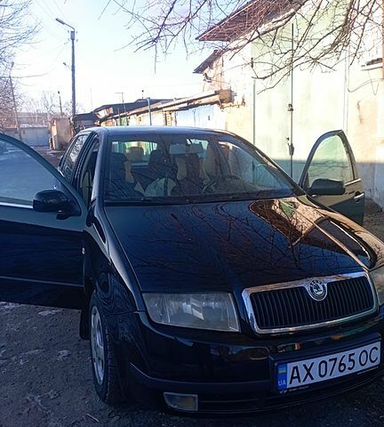 Чорний Шкода Фабія, об'ємом двигуна 1.4 л та пробігом 213 тис. км за 4700 $, фото 1 на Automoto.ua