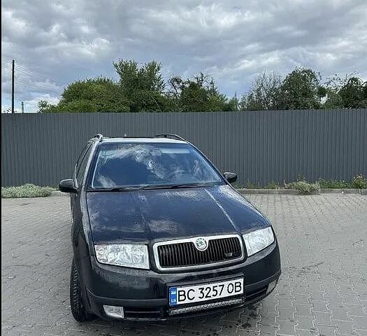 Черный Шкода Фабия, объемом двигателя 1.2 л и пробегом 350 тыс. км за 2800 $, фото 1 на Automoto.ua