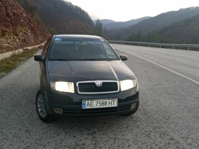 Черный Шкода Фабия, объемом двигателя 1.2 л и пробегом 300 тыс. км за 4350 $, фото 1 на Automoto.ua