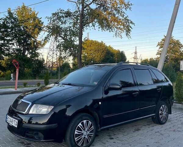 Черный Шкода Фабия, объемом двигателя 1.42 л и пробегом 275 тыс. км за 3800 $, фото 1 на Automoto.ua