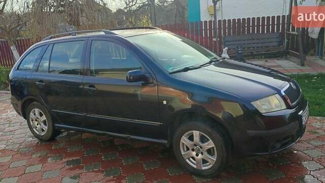 Черный Шкода Фабия, объемом двигателя 1.4 л и пробегом 387 тыс. км за 3500 $, фото 1 на Automoto.ua
