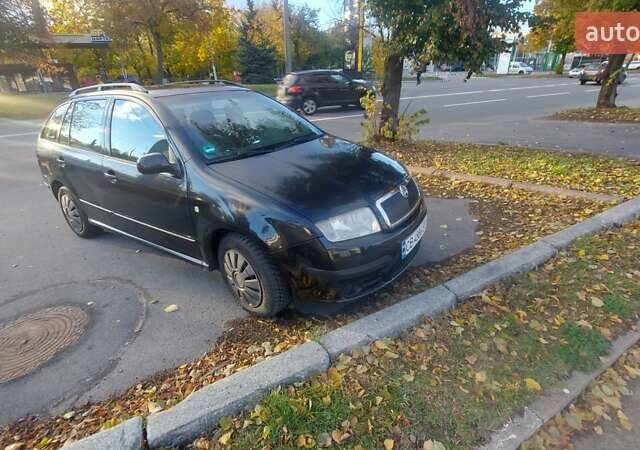 Черный Шкода Фабия, объемом двигателя 1.39 л и пробегом 320 тыс. км за 3899 $, фото 1 на Automoto.ua